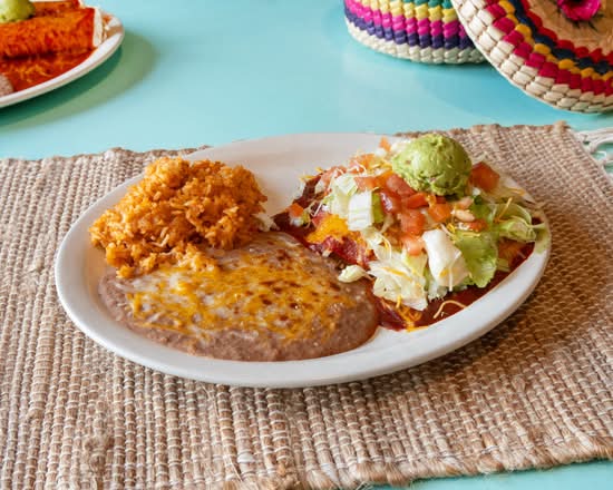 Tostada and enchilada combo plate with rice and beans