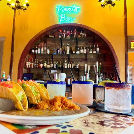 Piñata Bar — the lively bar at El Fenix Cafe with tacos and drinks